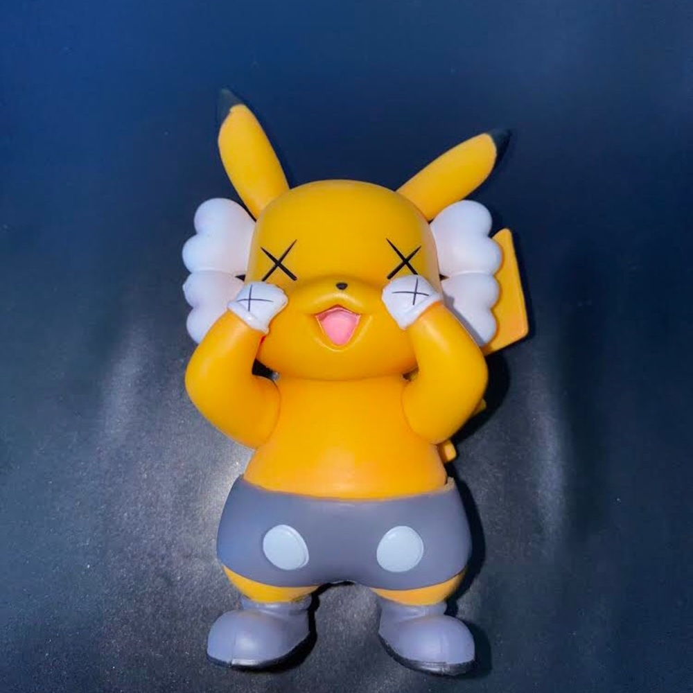 Takara Tomy Anime Kawaii Pokemon Brand KAWS Pikachu Yellow Version Doll Model